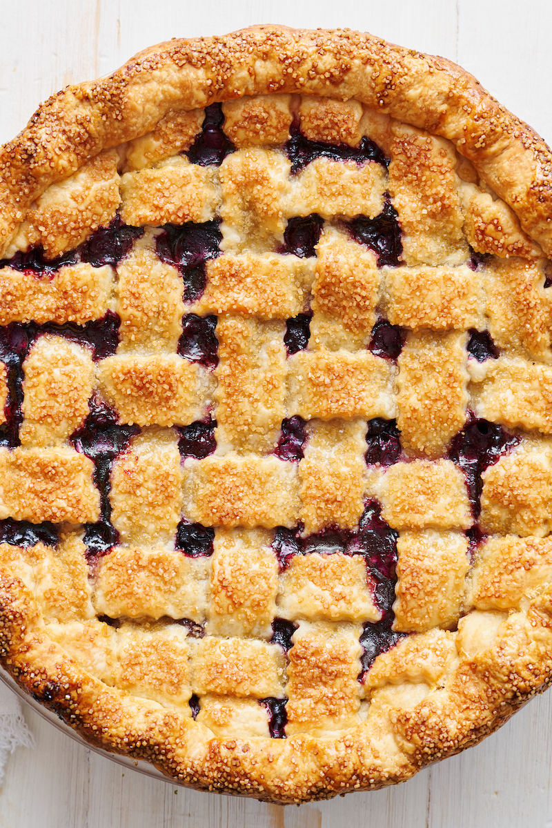 Nothing says "it's Summer!" quite like homemade blueberry pie topped with vanilla ice cream! Fresh or frozen berries will work, but I prefer fresh. So bust out your rolling pin and let's bake the pie!