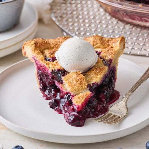 Nothing says "it's Summer!" quite like homemade blueberry pie topped with vanilla ice cream! Fresh or frozen berries will work, but I prefer fresh. So bust out your rolling pin and let's bake the pie!