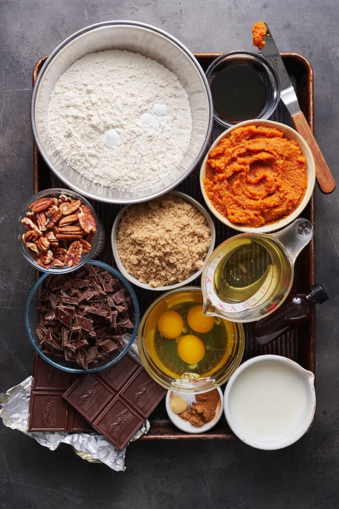 Ingredients for pumpkin chocolate chip muffins.