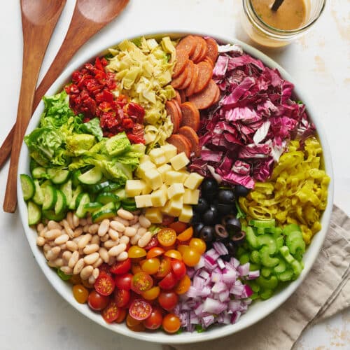 Big bowl of chopped salad ingredients ready to be tossed together.