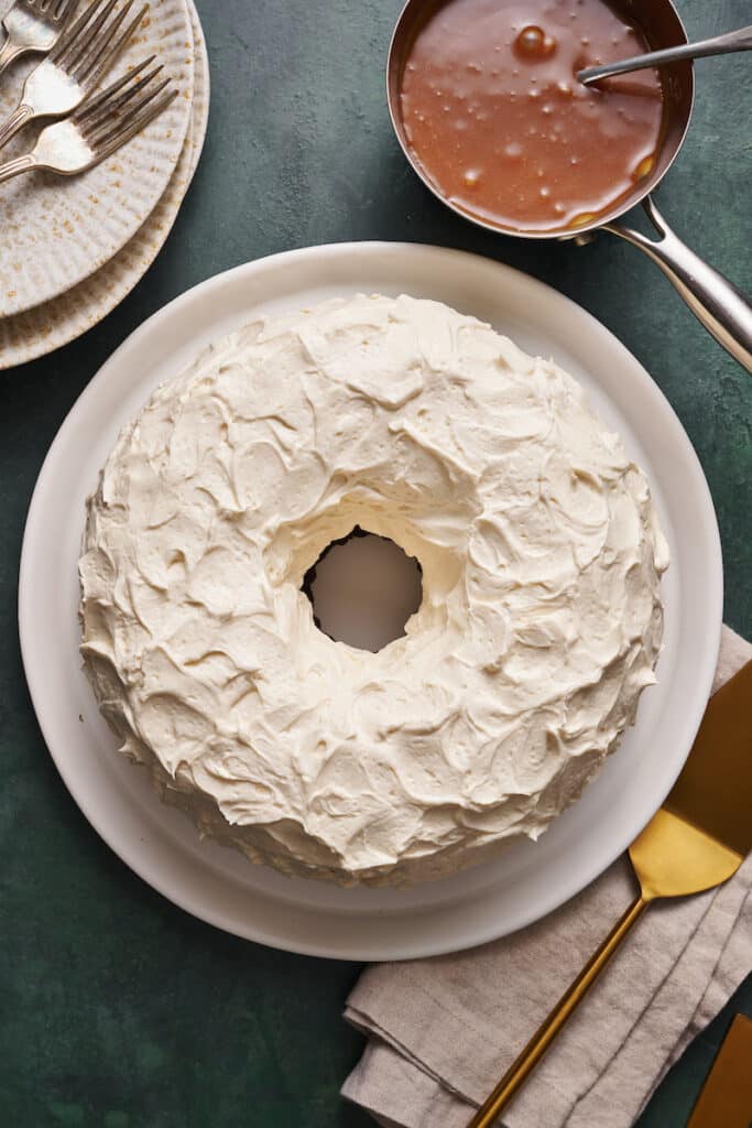 Frosted Guinness chocolate cake with caramel sauce on the side.