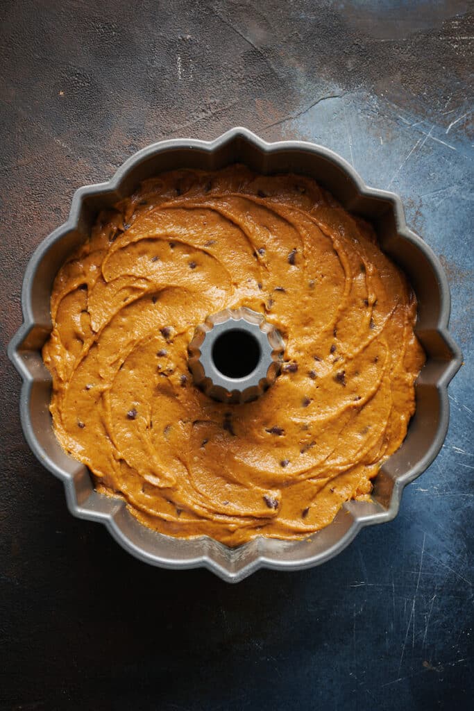 Pumpkin Bundt Cake Batter in the bundt pan. 