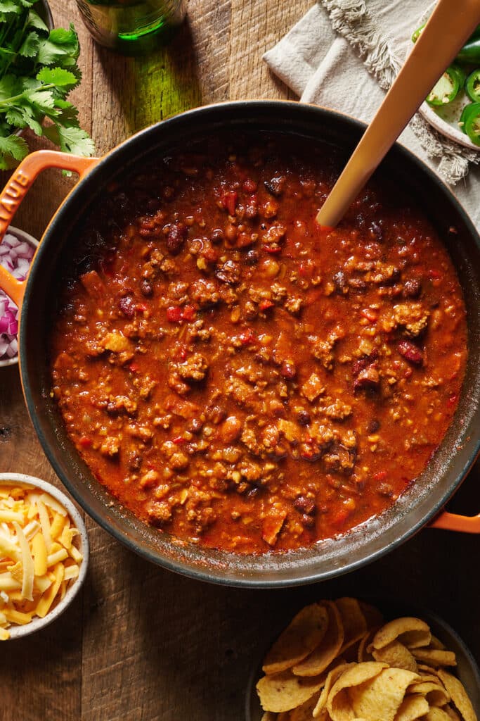 Pot of chili with ladle.