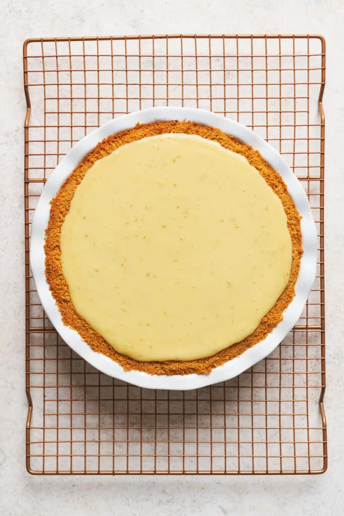 Key lime pie on a cooling rack. 