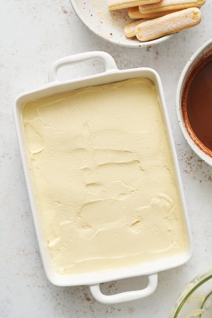 Baking dish with mascarpone filling on top.