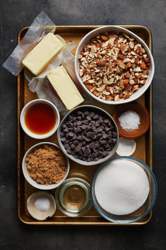 Ingredients for homemade toffee on a baking sheet.