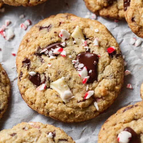 Chocolate chip candy cane cookies piled on a tray.