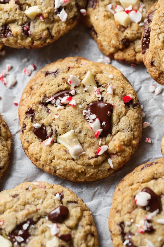 Chocolate chip candy cane cookies piled on a tray.