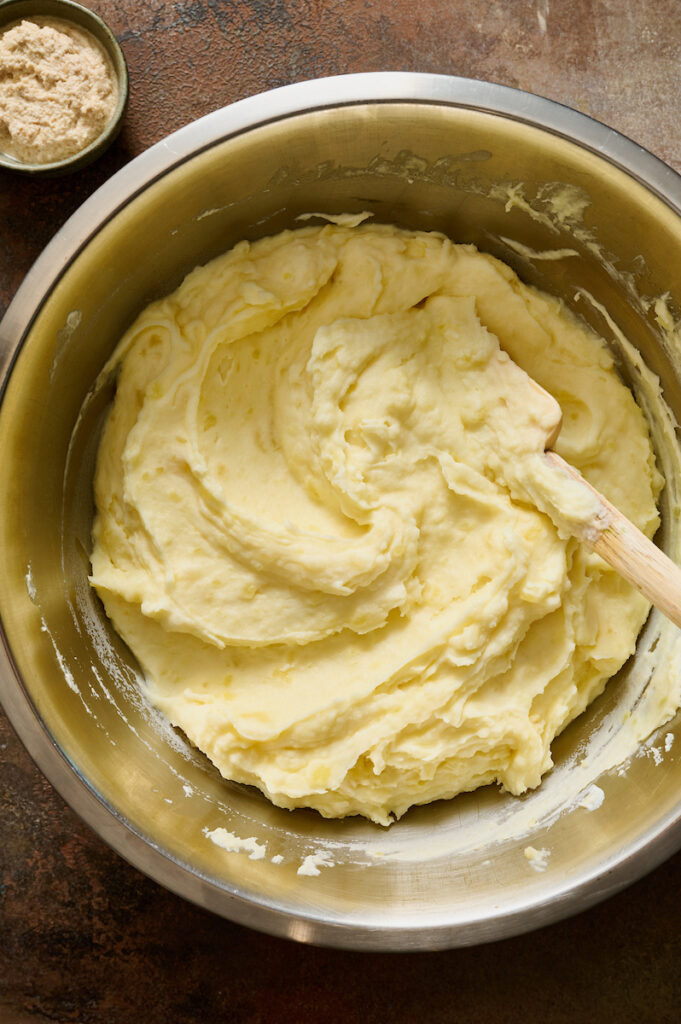 A bowl of mashed with creamy texture.