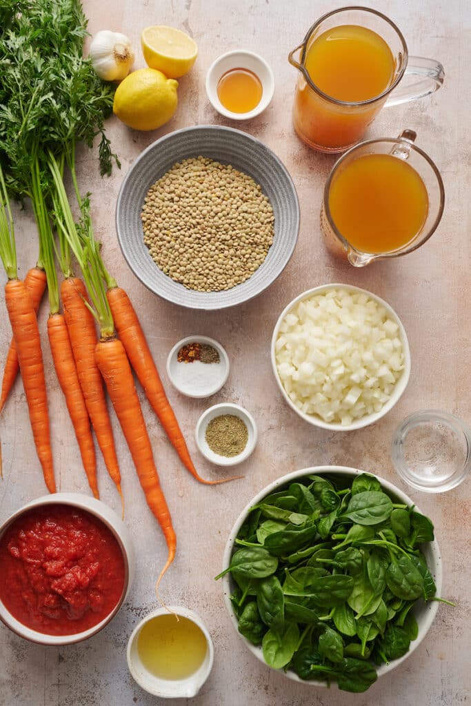 Ingredients for lentil soup on table.