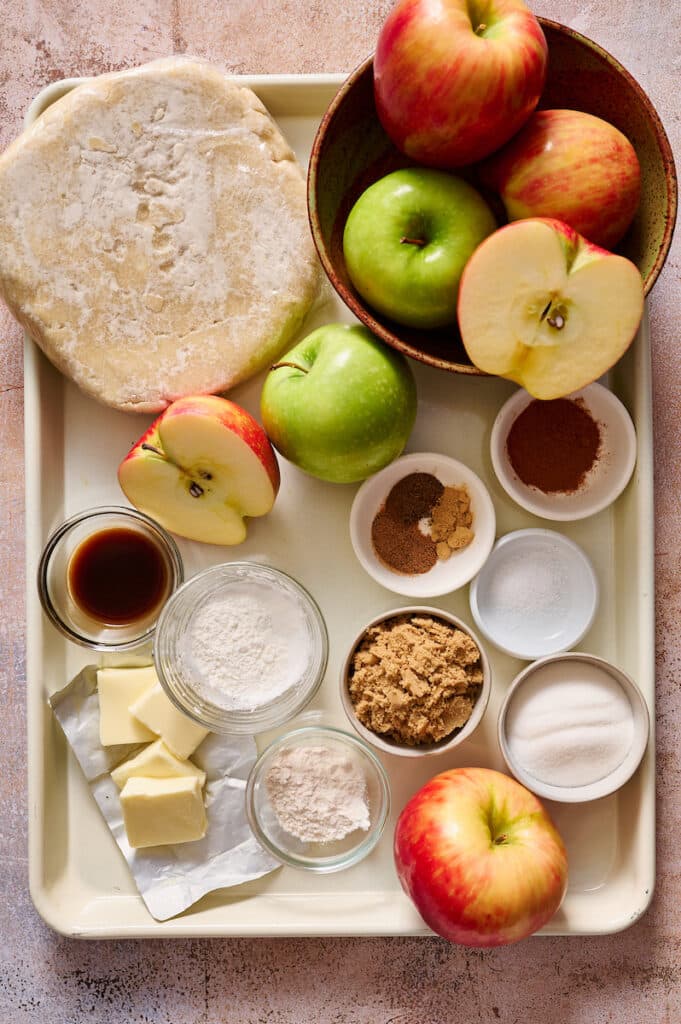 Ingredients for apple galette on baking sheet.